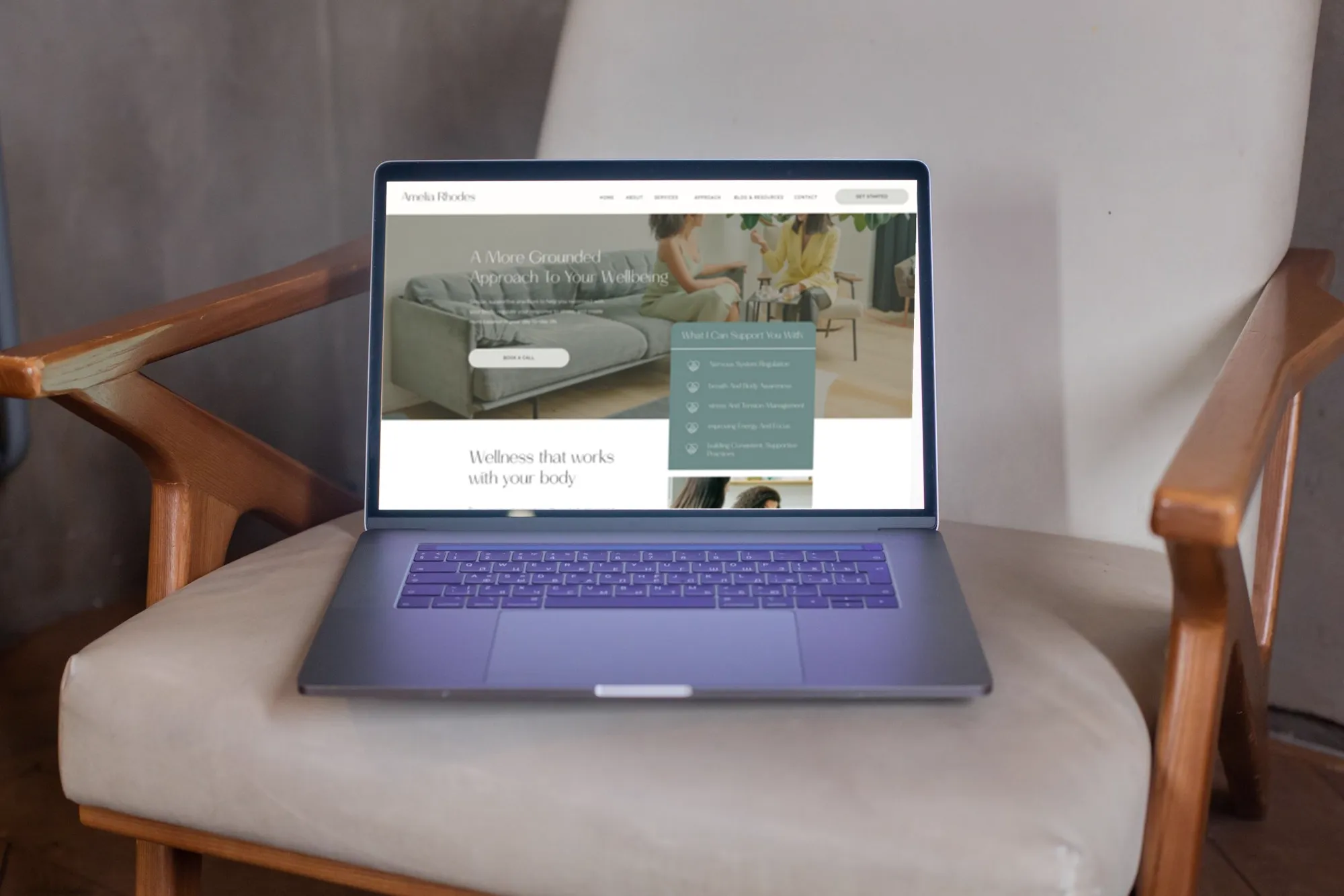 The Amelia Rhodes website template on a laptop